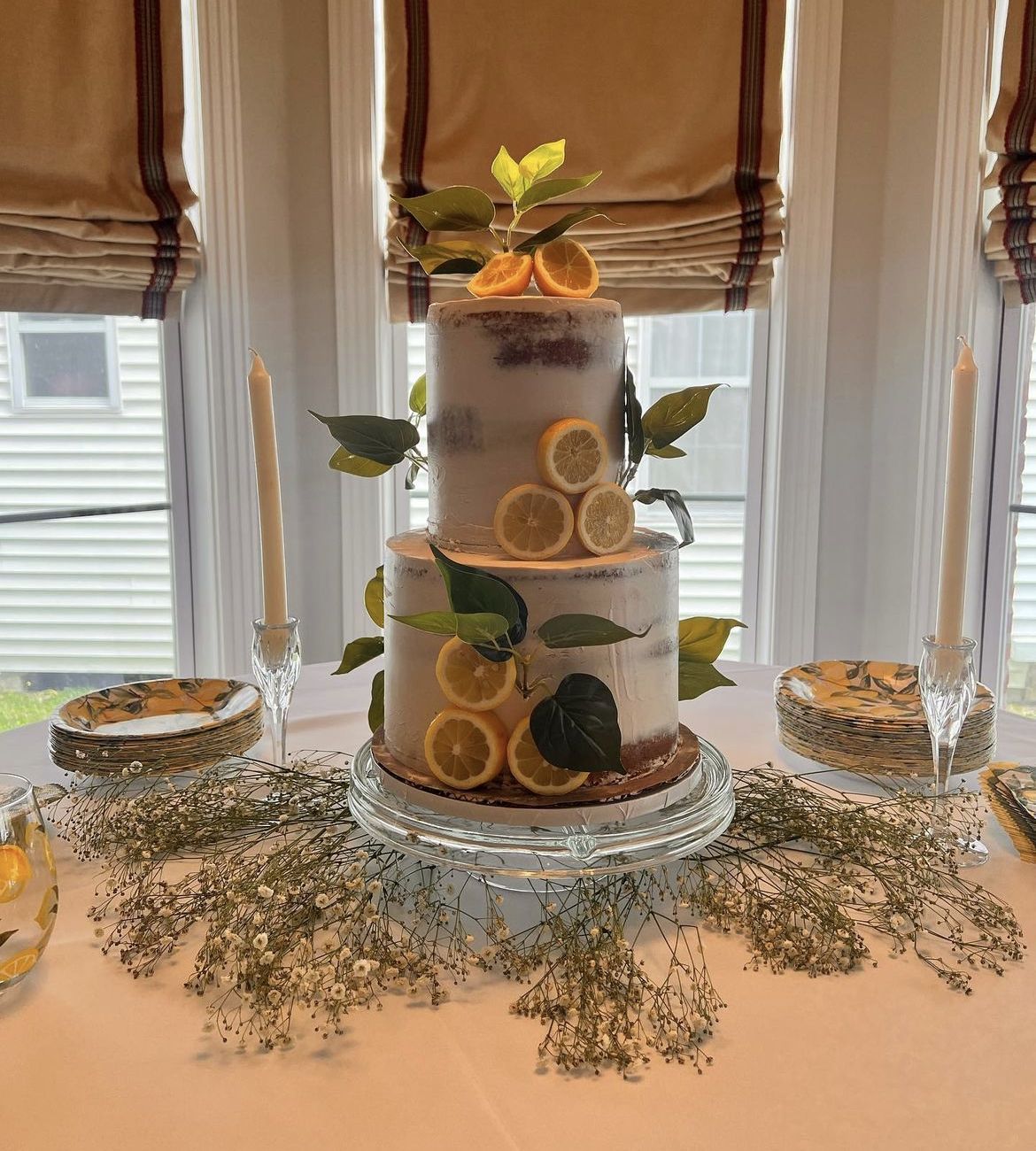 Gluten-free bridal shower cake with citrus and greenery